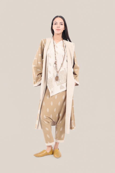 Patterned jacquard reversible asymmetric top
